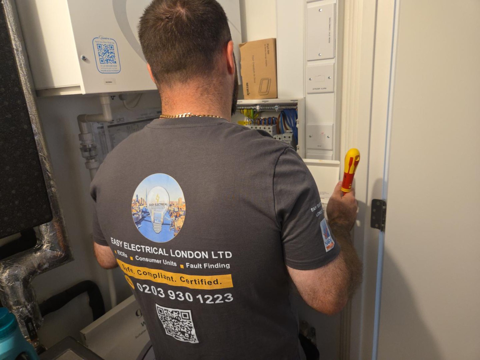 Easy Electrical London electrician working at an electrical installation